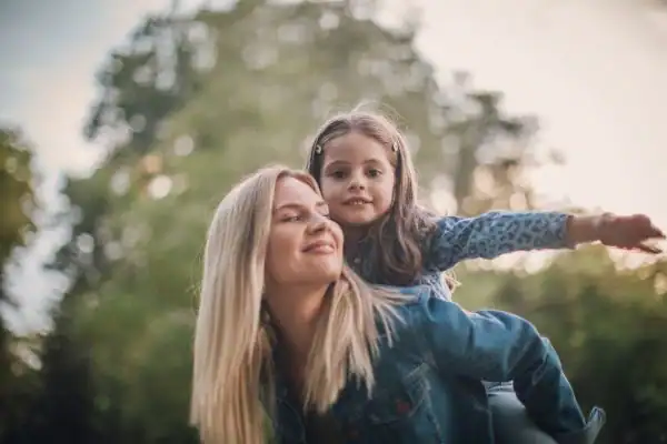 happy mum and daughter following mediation to resolve parental alienation Chelmsford